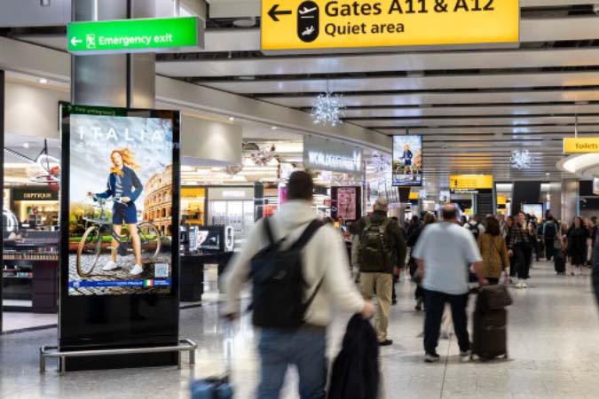 OOH advertising campaign promoting a travel destination in Heathrow Airport