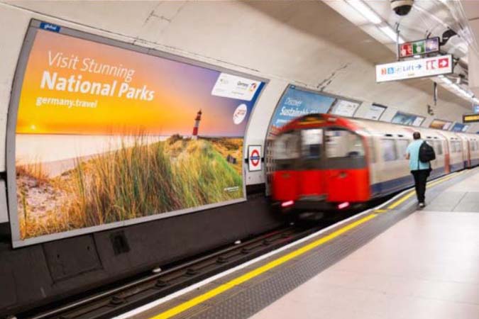 OOH advertising campaign promoting a travel destination in London Underground